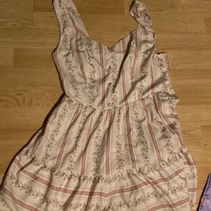 Beige dress with pink design